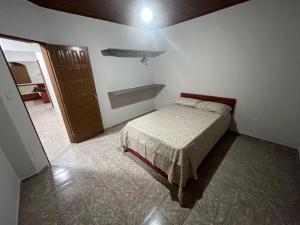 Postel nebo postele na pokoji v ubytování Casa Praia Guriri + 3 fotografie