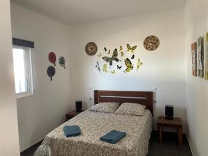 Postel nebo postele na pokoji v ubytování Villa sol e mar