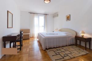 Postel nebo postele na pokoji v ubytování Apartment Parenzana