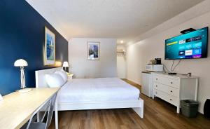 Rúm í herbergi á Cloud 9 Inn