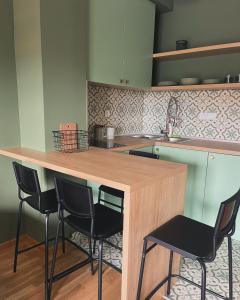 Cuisine ou kitchenette dans l'établissement DivciNovaS2