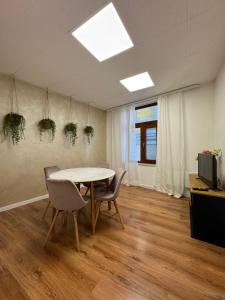 a dining room with a table and chairs at habitat Heart of Ruse Apartment in Ruse