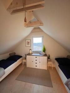 En eller flere senge i et værelse på Cudne Manowce