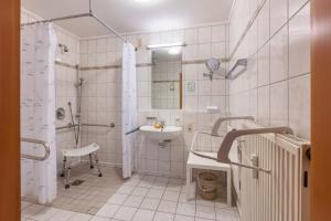 Koupelna v ubytování Apartments Am Schwarzwälder Hof + 86 fotografií