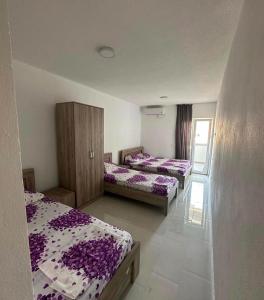 Postel nebo postele na pokoji v ubytování Vila Metohija