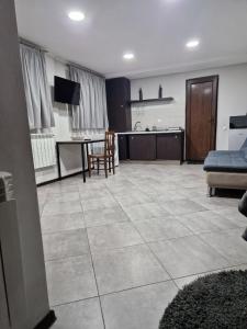 Kuchyň nebo kuchyňský kout v ubytování house hill