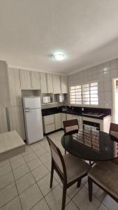 Køkken eller tekøkken på Residencial Claudino Lopes + 6 billeder