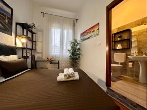 Postel nebo postele na pokoji v ubytování B&B CasaMia