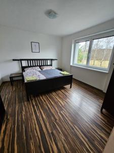 Postel nebo postele na pokoji v ubytování Apartmány Stará Voda