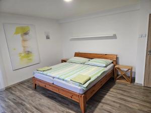 Postel nebo postele na pokoji v ubytování Apartmány Stará Voda