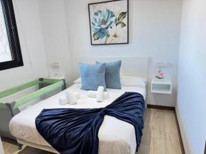 Una cama o camas en una habitación de Estancia Luciana