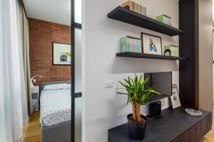 Μια τηλεόραση ή/και κέντρο ψυχαγωγίας στο Porta Romana Design Apartment