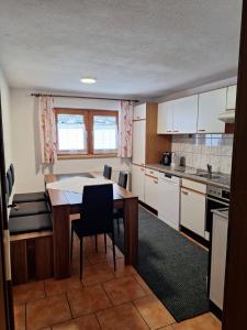 Kuchyňa alebo kuchynka v ubytovaní Ferienhof Bichlhof