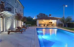 a swimming pool in a yard with a building at Villa Simeanna in Kringa +52 photos
