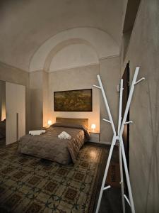 En eller flere senge i et værelse på Allegra House