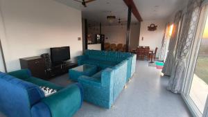 Un lugar para sentarse en Prakriti Villa - HillTop home in a nature