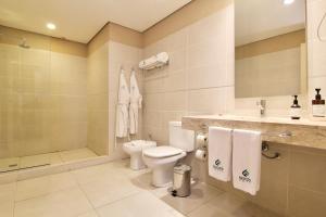 Ванная комната в Faro Norte Suites