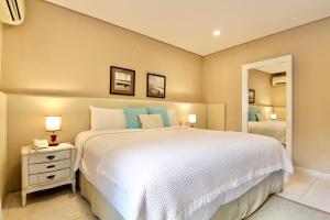 Кровать или кровати в номере Faro Norte Suites