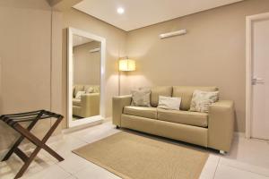 Гостиная зона в Faro Norte Suites