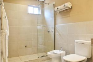 Ванная комната в Faro Norte Suites