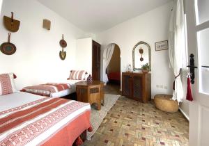 Postel nebo postele na pokoji v ubytování Riad l'Ayel d'Essaouira