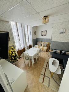 Posedenie v ubytovaní Appartement situé au cœur du village du Mont-Dore