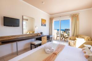 Postel nebo postele na pokoji v ubytování Nereides Hotel