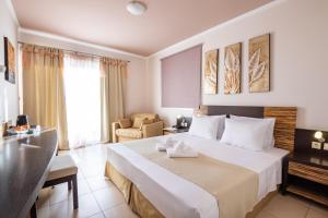 Postel nebo postele na pokoji v ubytování Nereides Hotel