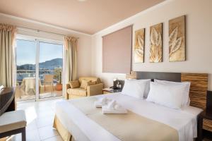 Postel nebo postele na pokoji v ubytování Nereides Hotel
