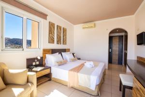 Postel nebo postele na pokoji v ubytování Nereides Hotel