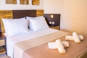 Postel nebo postele na pokoji v ubytování Nereides Hotel