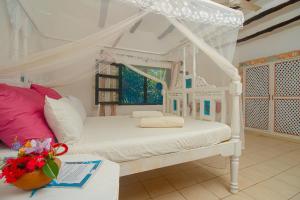 Postel nebo postele na pokoji v ubytování Watamu Sunrise Villa