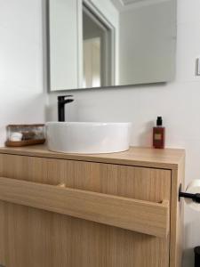 a bathroom vanity with a sink and a mirror at Mandarino 15 Las Colinas Golf in Orihuela Costa +28 photos