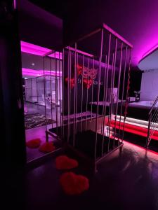 Ein Bett oder Betten in einem Zimmer der Unterkunft Les Secrets Rooms