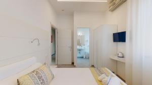 Posteľ alebo postele v izbe v ubytovaní Hotel Ligure