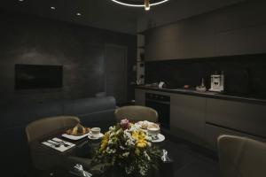TV a/nebo společenská místnost v ubytování Domus Rosae