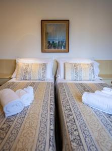 Posteľ alebo postele v izbe v ubytovaní Hotel Ligure