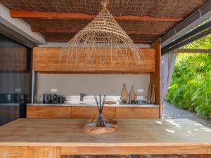 Kuchyň nebo kuchyňský kout v ubytování Le Bungalow Gypset