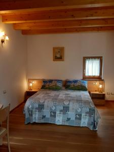 A bed or beds in a room at Casa Rosetta