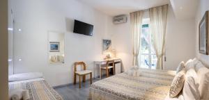 Posteľ alebo postele v izbe v ubytovaní Hotel Ligure