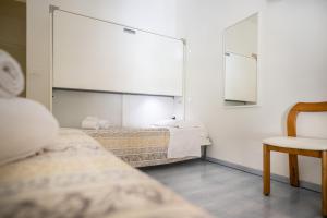 Posteľ alebo postele v izbe v ubytovaní Hotel Ligure