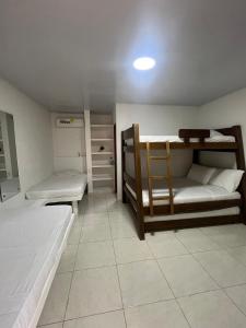 Postel nebo postele na pokoji v ubytování Hotel Heliopolis