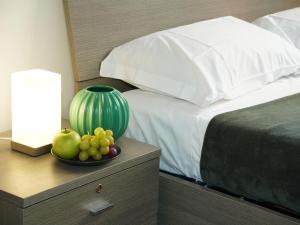 En eller flere senge i et værelse på Charming Home in Termini