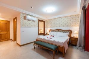 Cama ou camas em um quarto em Resende Imperial Hotel & Spa