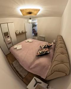 Postel nebo postele na pokoji v ubytování Nana Apartmani