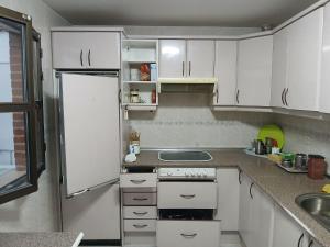 Kuchyň nebo kuchyňský kout v ubytování Toledo Double Private Room