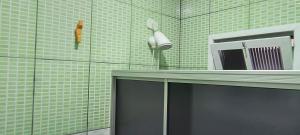 Et badeværelse på Pousadinha Guaratuba