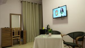 TV a/nebo společenská místnost v ubytování Good Season Hotel