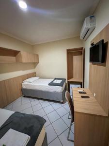Postel nebo postele na pokoji v ubytování Buriti Hotel Aracruz + 27 fotografií