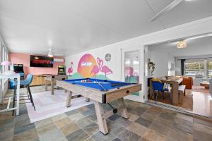 a living room with a pool table in it at Private Pool 6 MI to Clearwater Beach Fire Pit Game Room in Clearwater